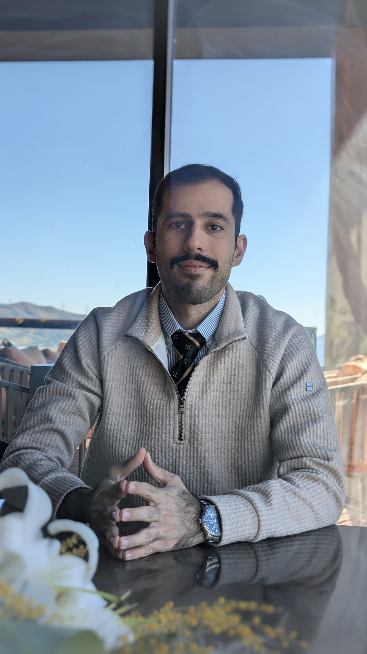 Soroush Jaberi seated in a formal portrait
